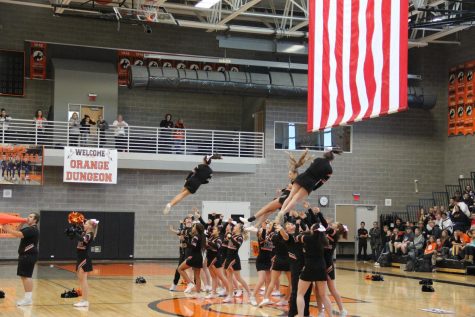 NC cheerleaders perform for Oil Bowl Pep Assembly.