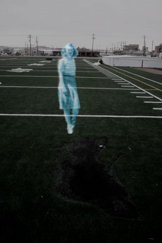 Ghostly girl in 1940's style skirt next to burnt track infield.