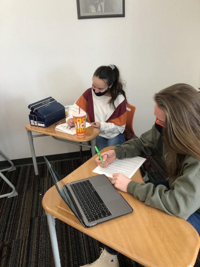Two IB history students study for their IB history test.
