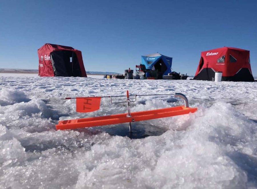 ice+fishing+hut+on+frozen+lake