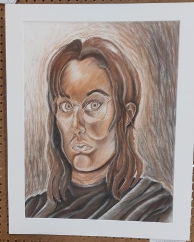 Brown and gray portrait of a girl with long hair and glasses.