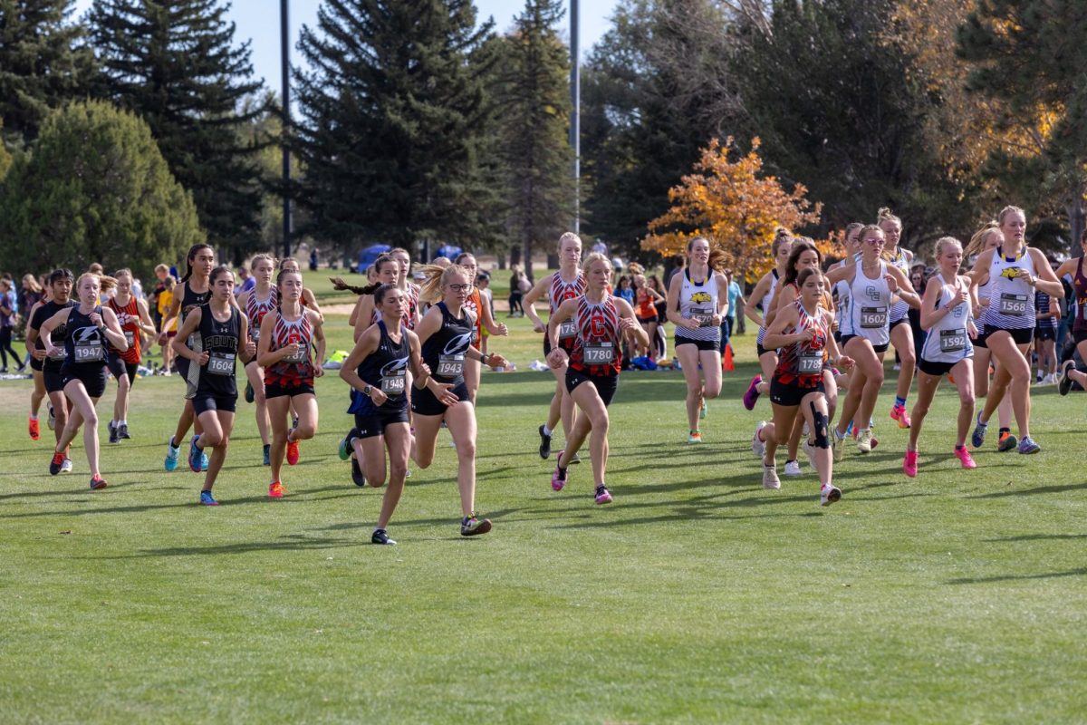 Natrona runners battle for position at the start of the state championship in Cheyenne on October 21st, 2023.