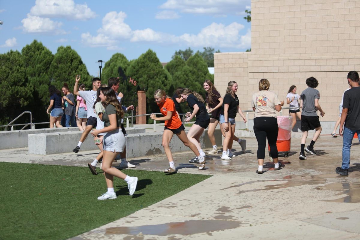 SOAKED
Student Council members go to war with water balloons as an ice-breaker team building exercise. The group met in the library on August 18th to begin planning important events, including community night, homecoming, and senior sunrise.