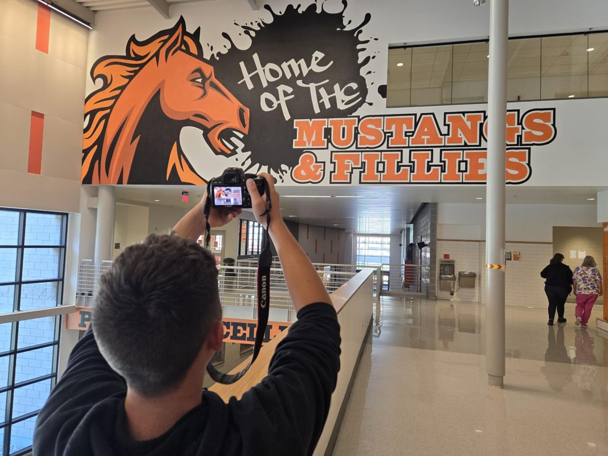 Emmett Myers is capturing a photo for an upcoming news article. Photography is a big part of journalism and this club. “Photography is important in journalism because taking a picture of a scene can portray more emotion and information than writing an article or story,” said Myers.