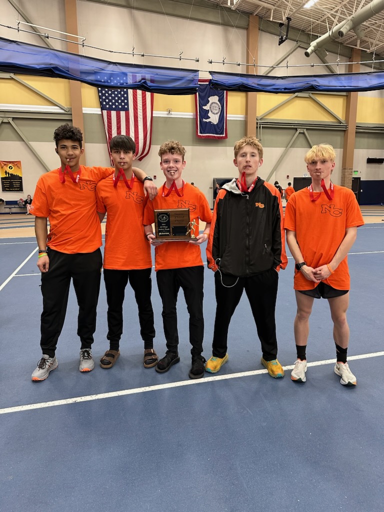 Running to success. The mustang's 1600 relay team pose with their metals after placing at state. This year they hope to preform and place higher than last year. "I’m feeling excited but also a little sad that it’s my last season," said senior Dylan Genzler.